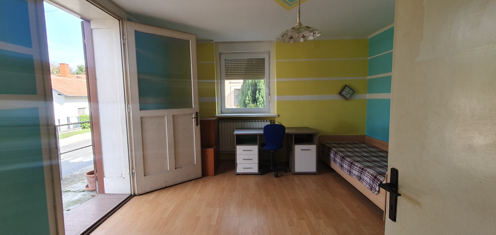 Prostorno stanovanje, z večjim kletnim prostorom
